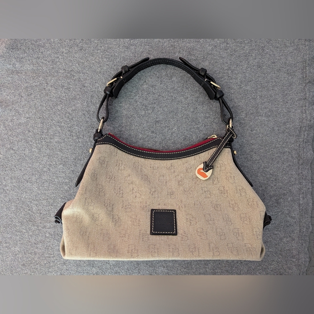 Dooney & Bourke Beige Canvas Satchel with Black Trim and Red Accent